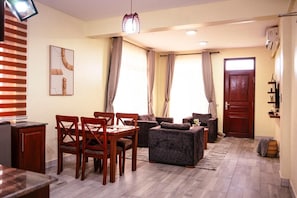 Standard Apartment, Balcony, Garden Area | Living area
