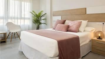 2 dormitorios, tabla de planchar con plancha, Internet y ropa de cama