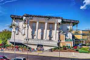 A building with a large entrance and a sign reading "WonderWorks".