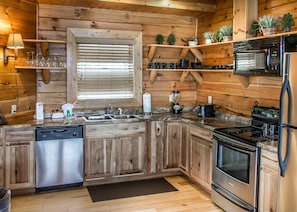 Coffee/tea maker, fridge, microwave, oven
