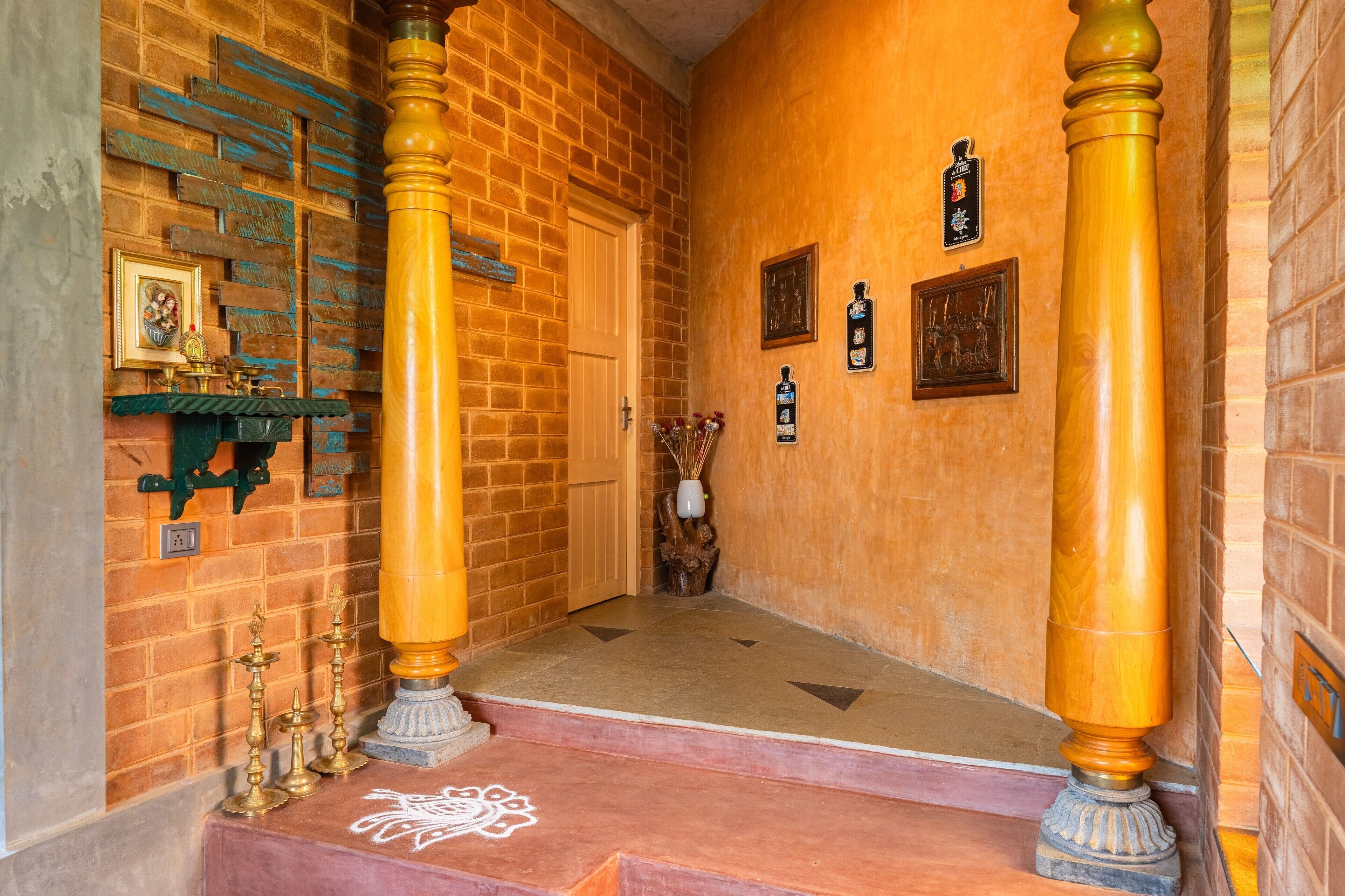 A staircase with a traditional design, featuring wooden balusters and a patterned floor.