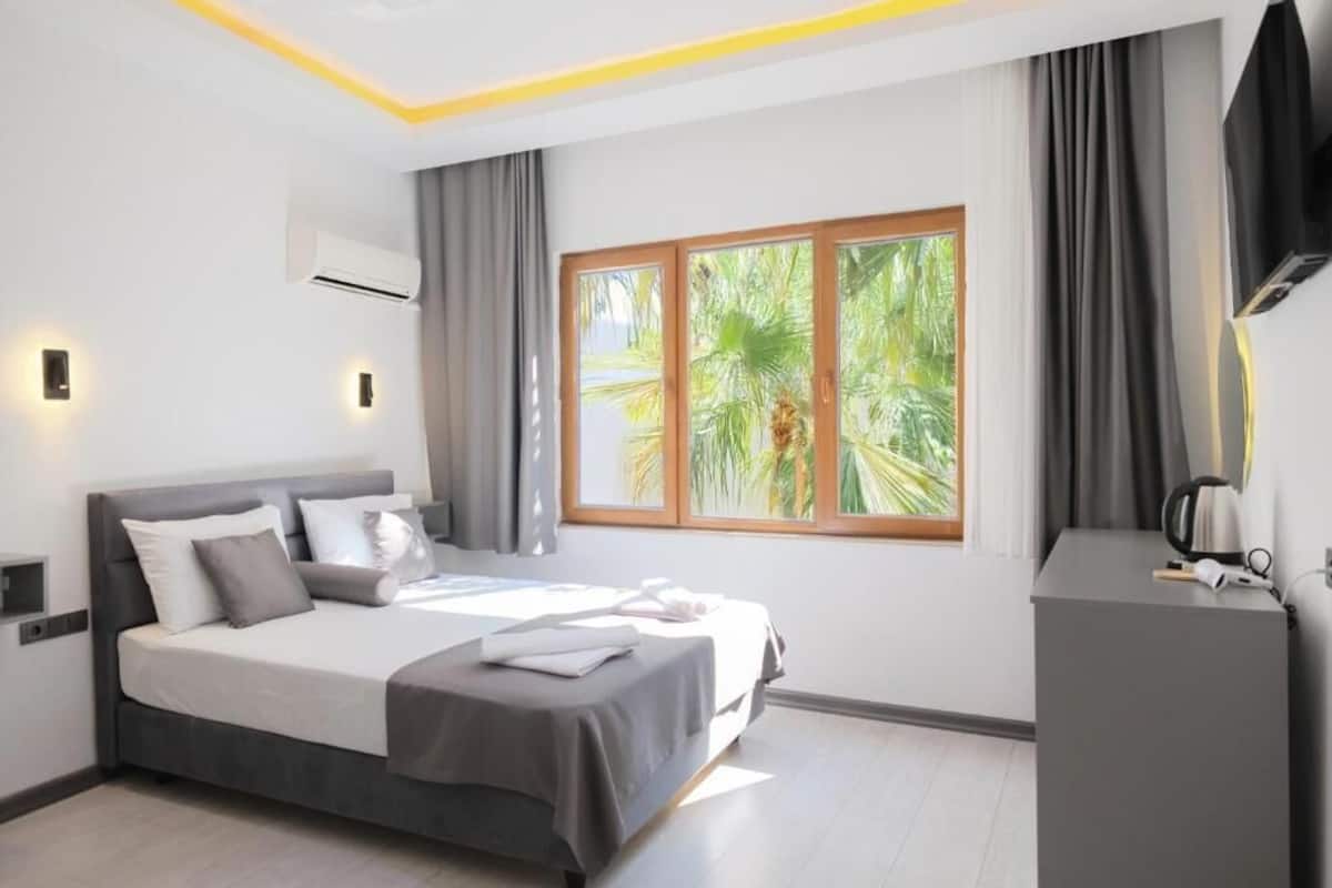 Habitación doble Deluxe | Escritorio y wifi gratis