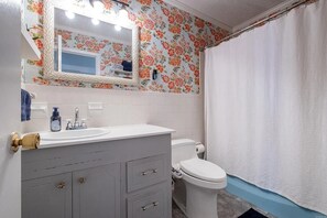 Shower, towels, soap, toilet paper