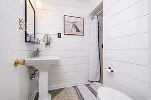 Shower, towels, soap, toilet paper