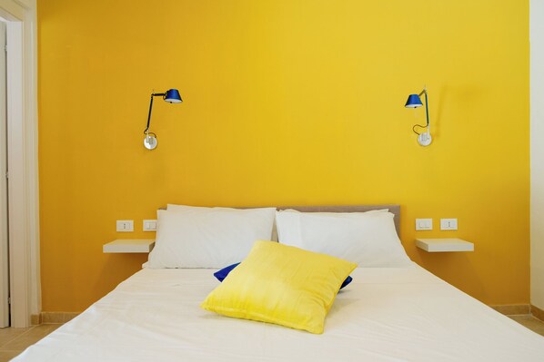 Deluxe Room, Patio, Pool View | Down comforters, memory foam beds, desk, laptop workspace