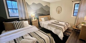 3 bedrooms, desk, iron/ironing board, travel cot