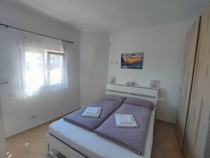 2 dormitorios, tabla de planchar con plancha, wifi y ropa de cama