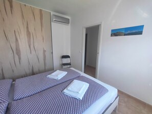 2 bedrooms, iron/ironing board, WiFi, bed sheets