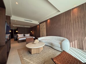 Junior Studio Suite, Garden View | In-room safe, blackout drapes, soundproofing, iron/ironing board