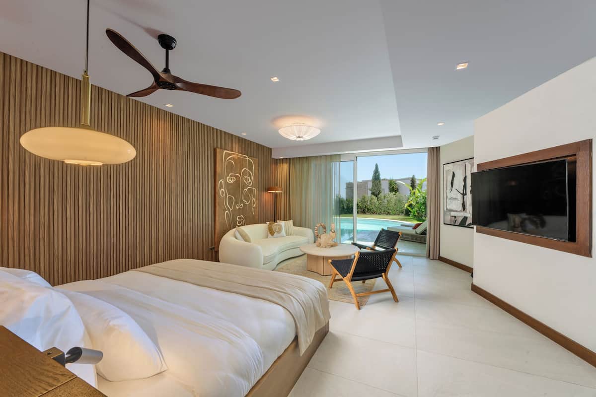 Junior Studio Suite, Patio, Garden View | In-room safe, blackout drapes, soundproofing, iron/ironing board