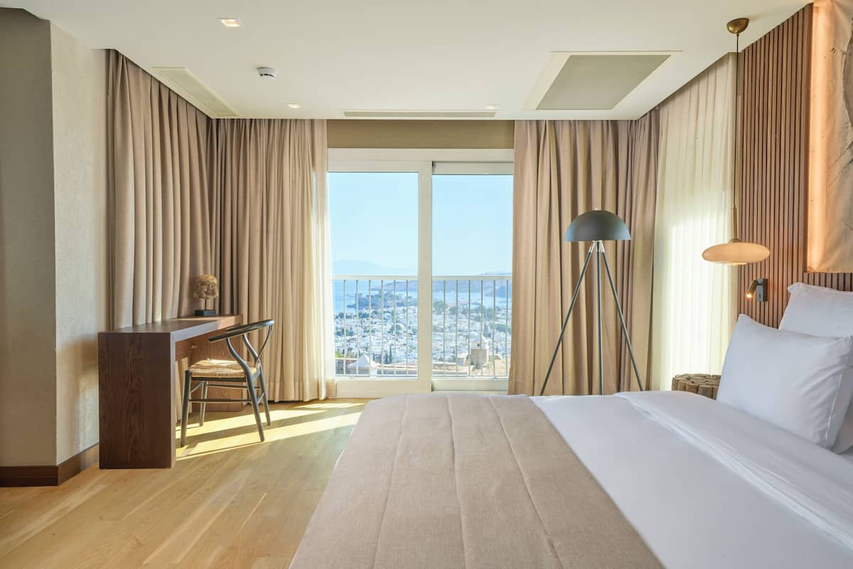 Junior Studio Suite, Sea View | In-room safe, blackout drapes, soundproofing, iron/ironing board