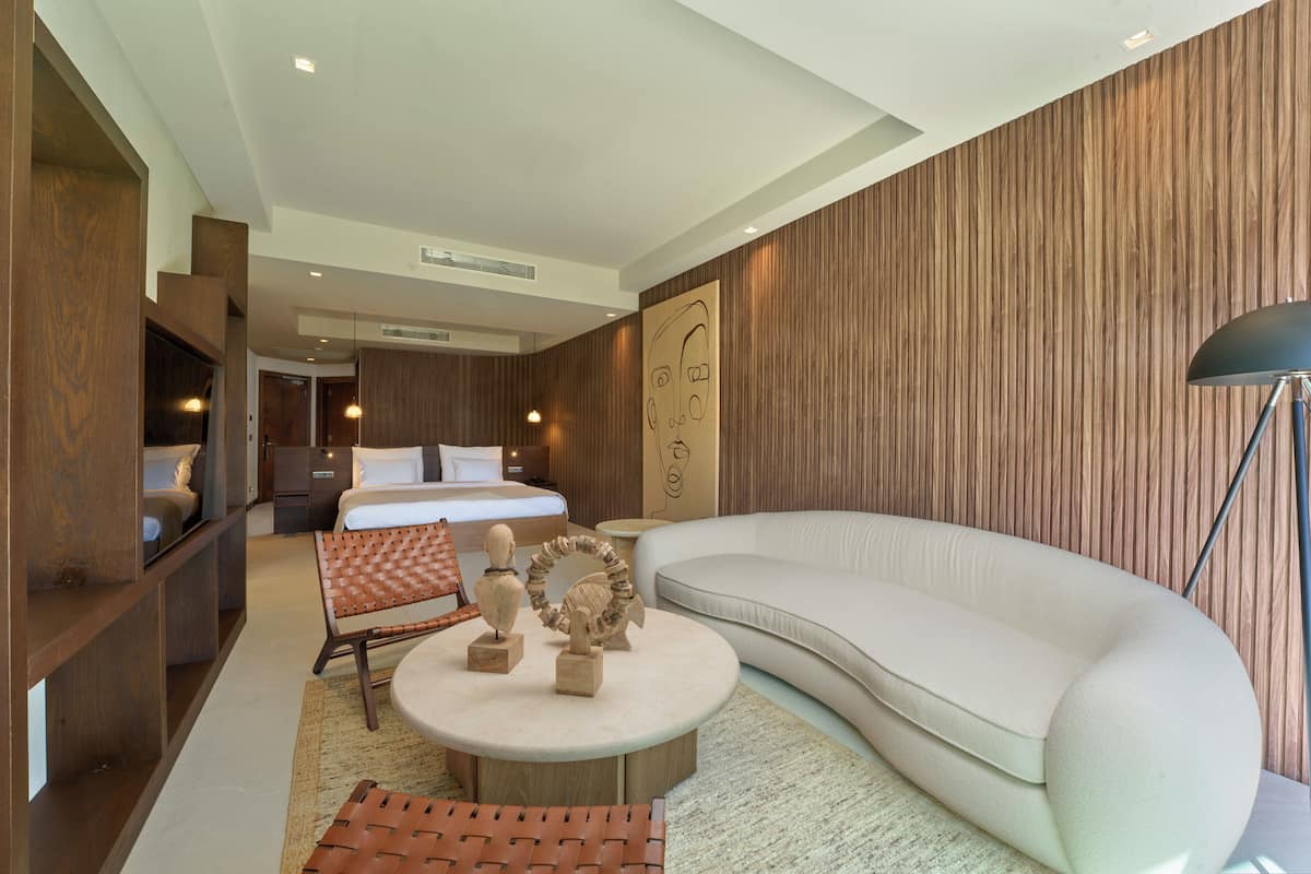 Junior Studio Suite, Garden View | In-room safe, blackout drapes, soundproofing, iron/ironing board
