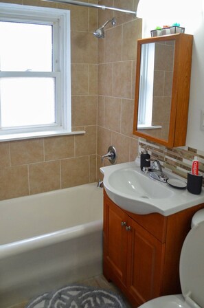 Hair dryer, towels, soap, toilet paper