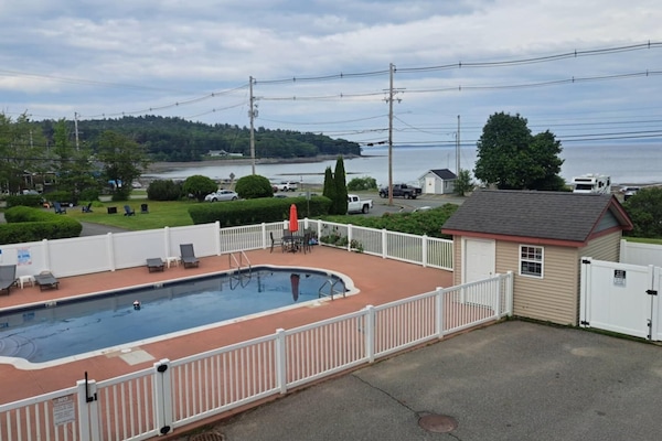 View from our balcony towards pool and ocean.