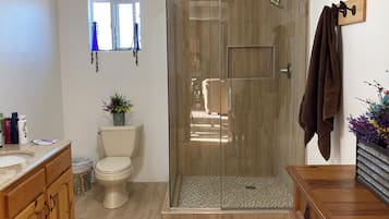 Shower, hair dryer, towels, soap