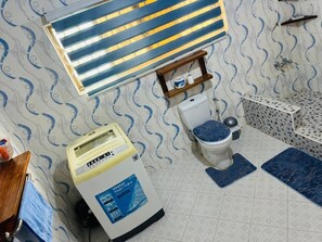 Shower, towels, soap, toilet paper - DKD apartment home away from home (Cape Coast)