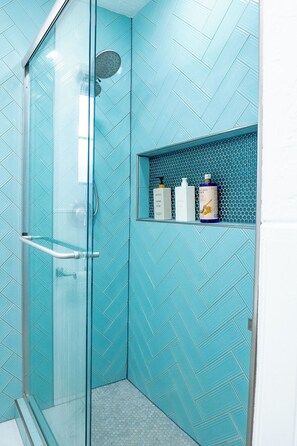Shower, hair dryer, towels, soap