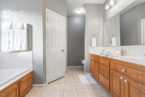 Shower, jetted tub, hair dryer, towels
