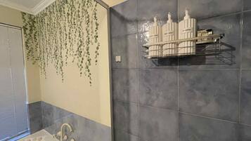 Shower, hair dryer, towels, soap