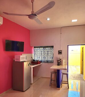 Fridge, microwave, stovetop, coffee/tea maker