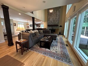 Smart TV, fireplace, books, printers