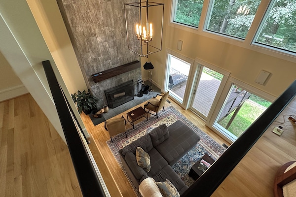 View of main floor living room from 2nd floor living area