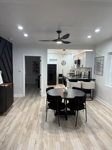 Welcome! This stylish and spacious three-story gateway