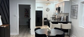 Welcome! This stylish and spacious three-story gateway