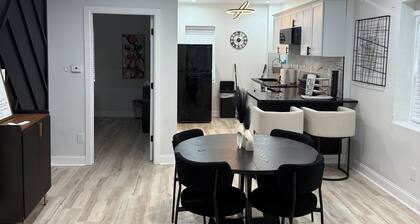 Welcome! This stylish and spacious three-story gateway