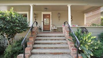 Front entry with brick steps and covered porch