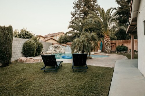 Spacious 4BDRM with a Stunning Pool+Game Room and Firepit