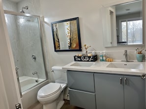 Hair dryer, towels, soap, shampoo