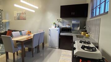 Fridge, microwave, stovetop, coffee/tea maker