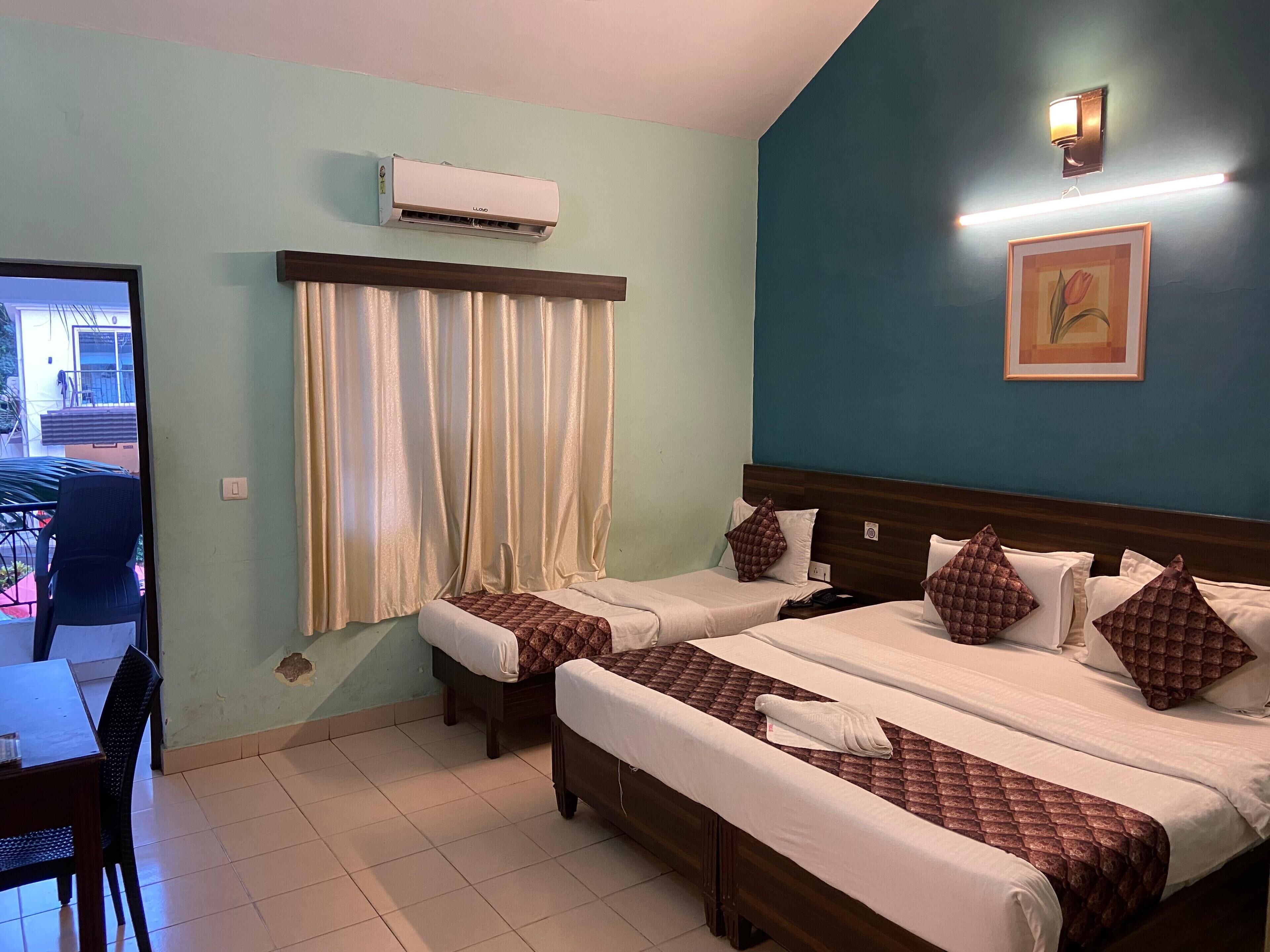 Family Triple Room, Balcony | Desk, free WiFi
