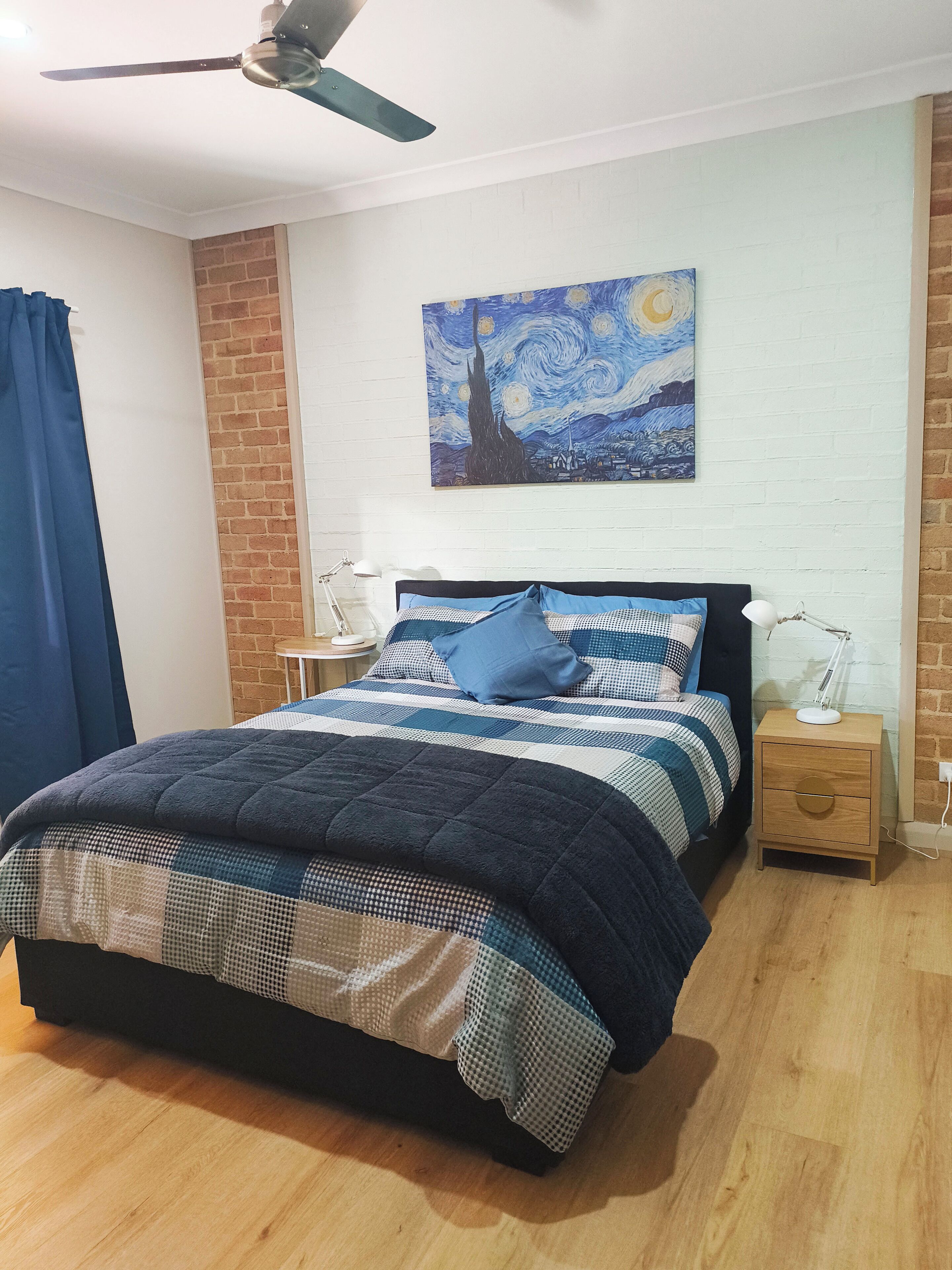 Queen size bed with linen, pillows, doona & blankets. Side tables & lamps