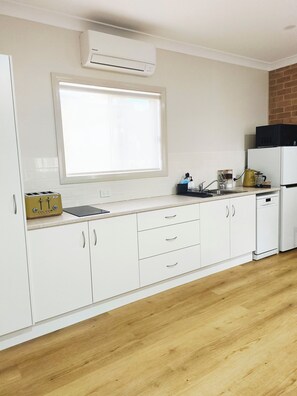 Microwave, stovetop, dishwasher, paper towels