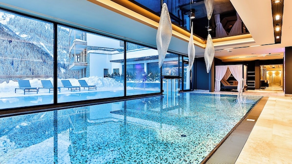 Indoor pool, outdoor pool, open 8:00 AM to 8:00 PM, pool umbrellas