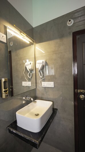 Hair dryer, slippers, towels, soap