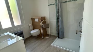 Hair dryer, towels, toilet paper