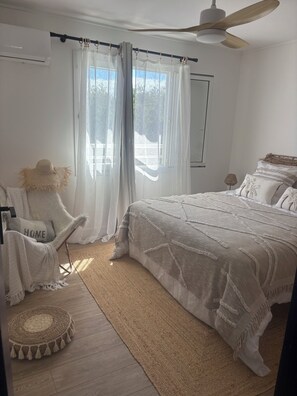 2 habitaciones, tabla de planchar con plancha y ropa de cama 