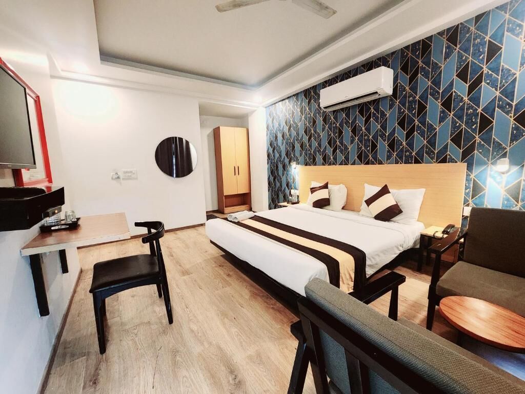 Deluxe Double Room, Balcony, City View | Desk, laptop workspace, free WiFi