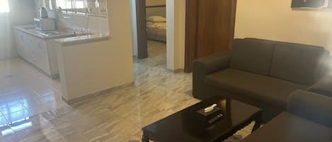 Departamento familiar, vista a la ciudad | Área de sala de estar