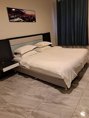 Family Apartment, City View | In-room safe, blackout drapes, free WiFi