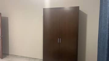 Family Apartment, City View | In-room safe, blackout curtains, free WiFi