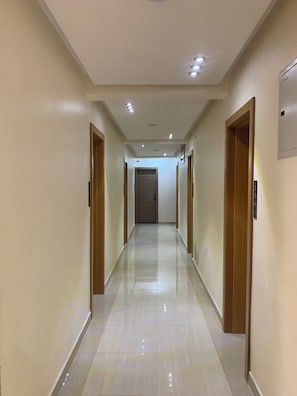 Quarto solteiro luxo, vista para a cidade | Área de estar