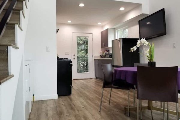 KITCHEN AND LIVING ROOM ON SECOND FLOOR UPSTAIRS