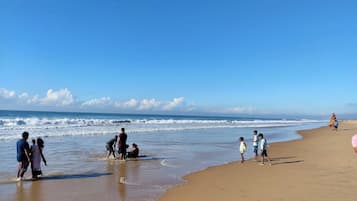 On the beach, white sand