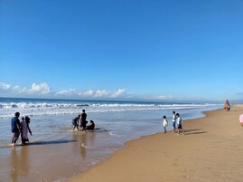 On the beach, white sand