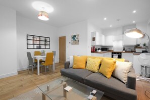 Family Apartment | Living area | 42-inch Smart TV with digital channels, Netflix, streaming services - Eastons 1 Bedroom Apt. with Sofa Bed (High Wycombe)