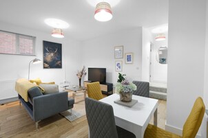 Family Apartment | Living area | 42-inch Smart TV with digital channels, Netflix, streaming services